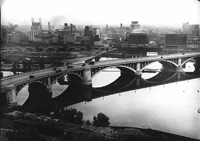 Minneapolis mill district 1935 _third Ave_ bridge_.jpg